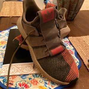 Adidas shoes wore a handful of times just to many shoes.  Like new, no box